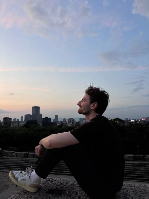 Felix watching the sunset over Austin, Texas